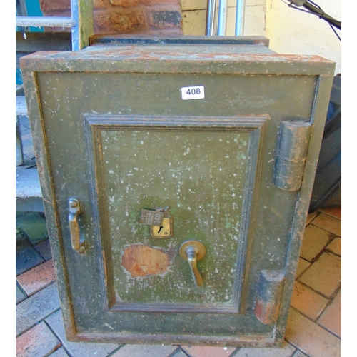 408 - Antique cast iron safe,  26 x 20.5 x 21