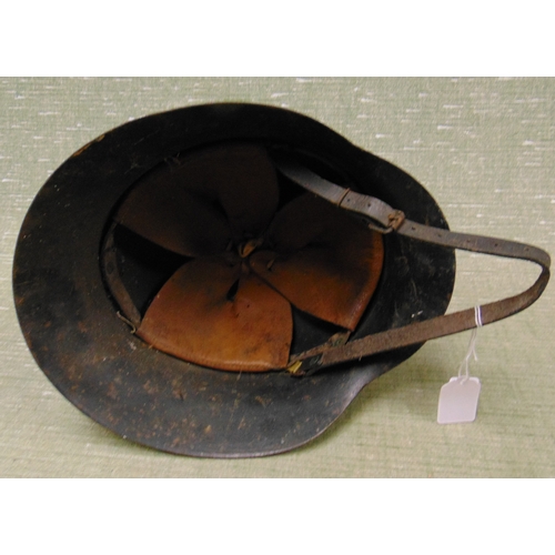 128 - German 2nd World War steel helmet with inner liner.