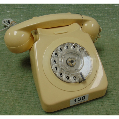 139 - Cream coloured telephone.