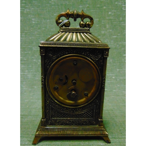 194 - Gilt cased mantle clock, having Roman numerals.