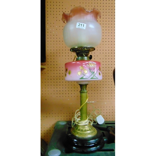 211 - Victorian oil lamp, having pink and floral glass reservoir, converted.