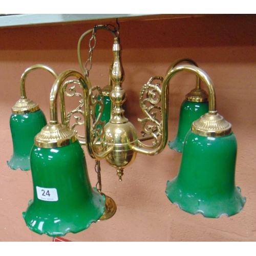 24 - Ornate gilt metal five branch light fitting, having green glass shades.