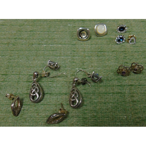 360 - Various earrings, to include a silver example with diamond chips.