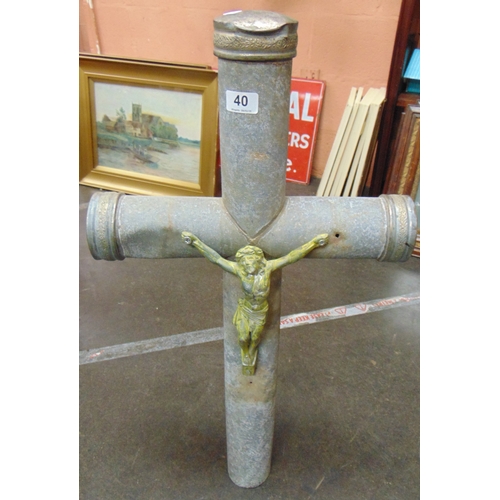 40 - Cylindrical metal crucifix, 31