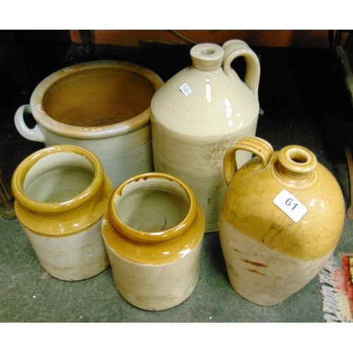 61 - Stoneware two handled container, two flagons and two storage jars.