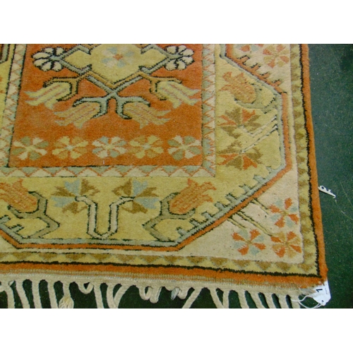 11 - Red and yellow ground rug, having geometric pattern, 112 x 33