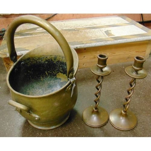 217 - Brass coal bucket and a pair of candlesticks.