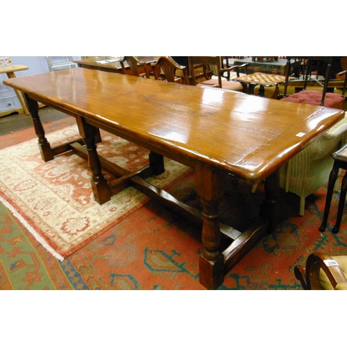 390 - Good large oak refectory table, the rectangular top having cleated ends, set on six baluster turned ... 