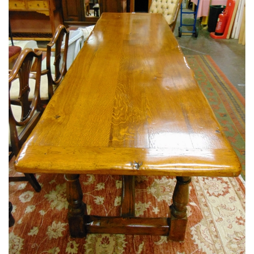 390 - Good large oak refectory table, the rectangular top having cleated ends, set on six baluster turned ... 