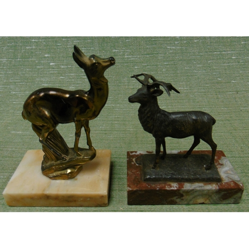 464 - Four metal animal figures on rectangular bases.