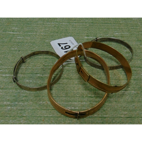 167 - Rolled gold bangle, one other and two silver bangles.