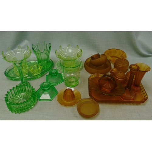 115 - Collection of green glass and an amber glass dressing table set.
