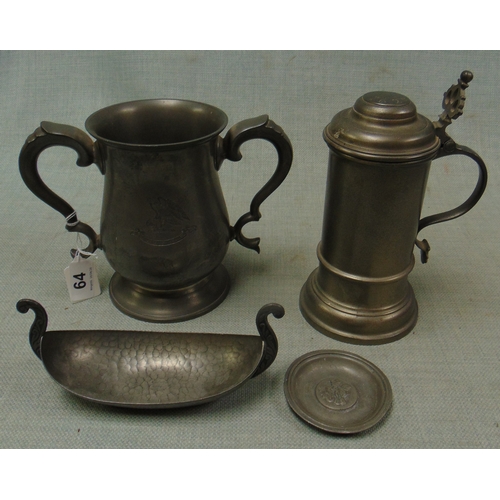 64 - Pewter two handled loving cup, lidded tankard, Meum pewter bat form bowl and a pin tray.