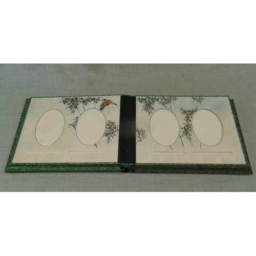 72 - An Oriental lacquered photograph album, in original wooden box.