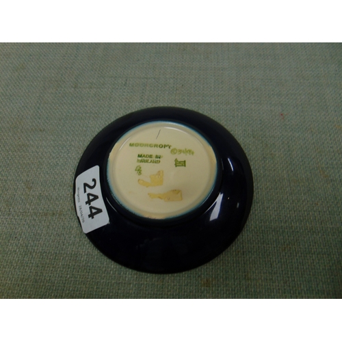 244 - Moorcroft floral decorated pin tray, 4.5