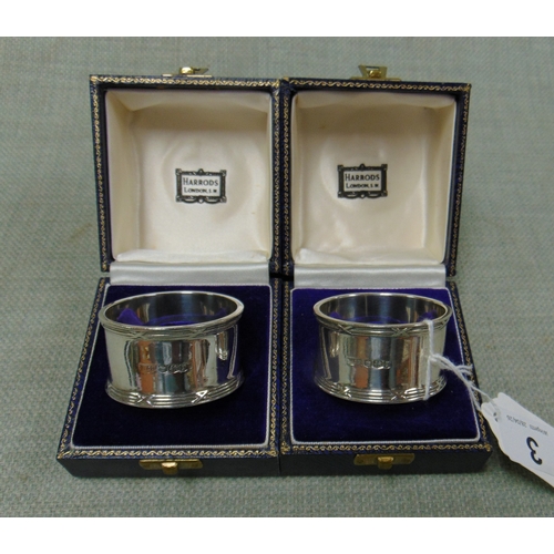 3 - Pair of cased silver napkin holders, maker Walker and Hall, Sheffield 1934, retailed by Harrods, 2.7... 