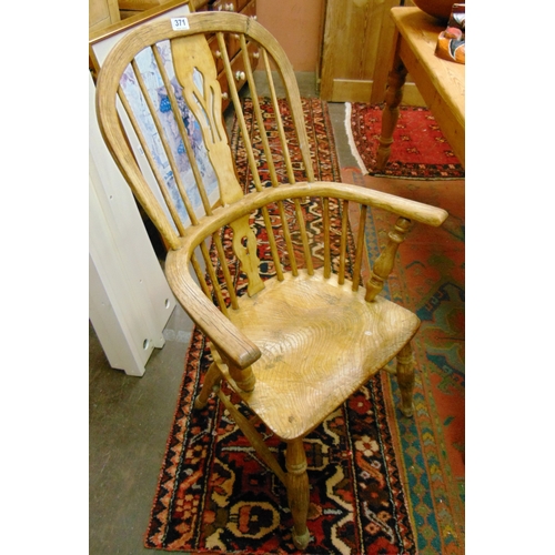 371 - Antique elm Windsor chair, pierced splat back, open arms, solid seat on turned supports and H shaped... 