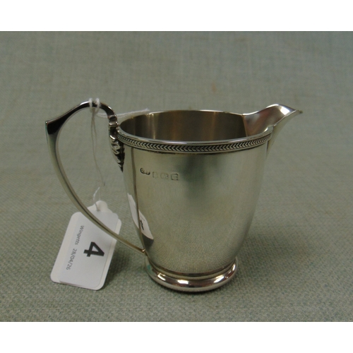4 - Silver christening mug, having loop handle, maker Deakin & Sons, Birmingham 1931, 4.1 ozt.