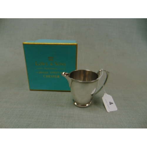 4 - Silver christening mug, having loop handle, maker Deakin & Sons, Birmingham 1931, 4.1 ozt.