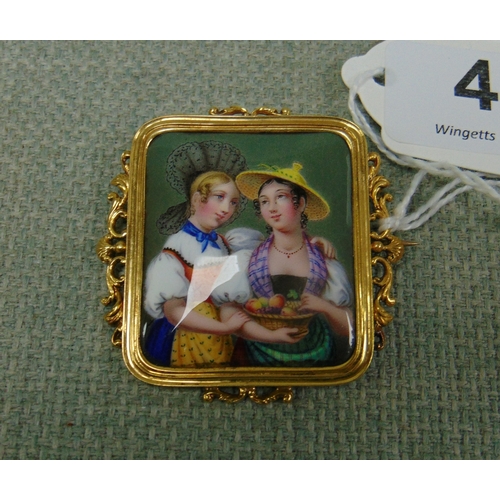 49 - Antique porcelain brooch, decorated with classical continental ladies, within an ornate gilt metal f... 