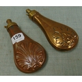 Two copper powder flasks.