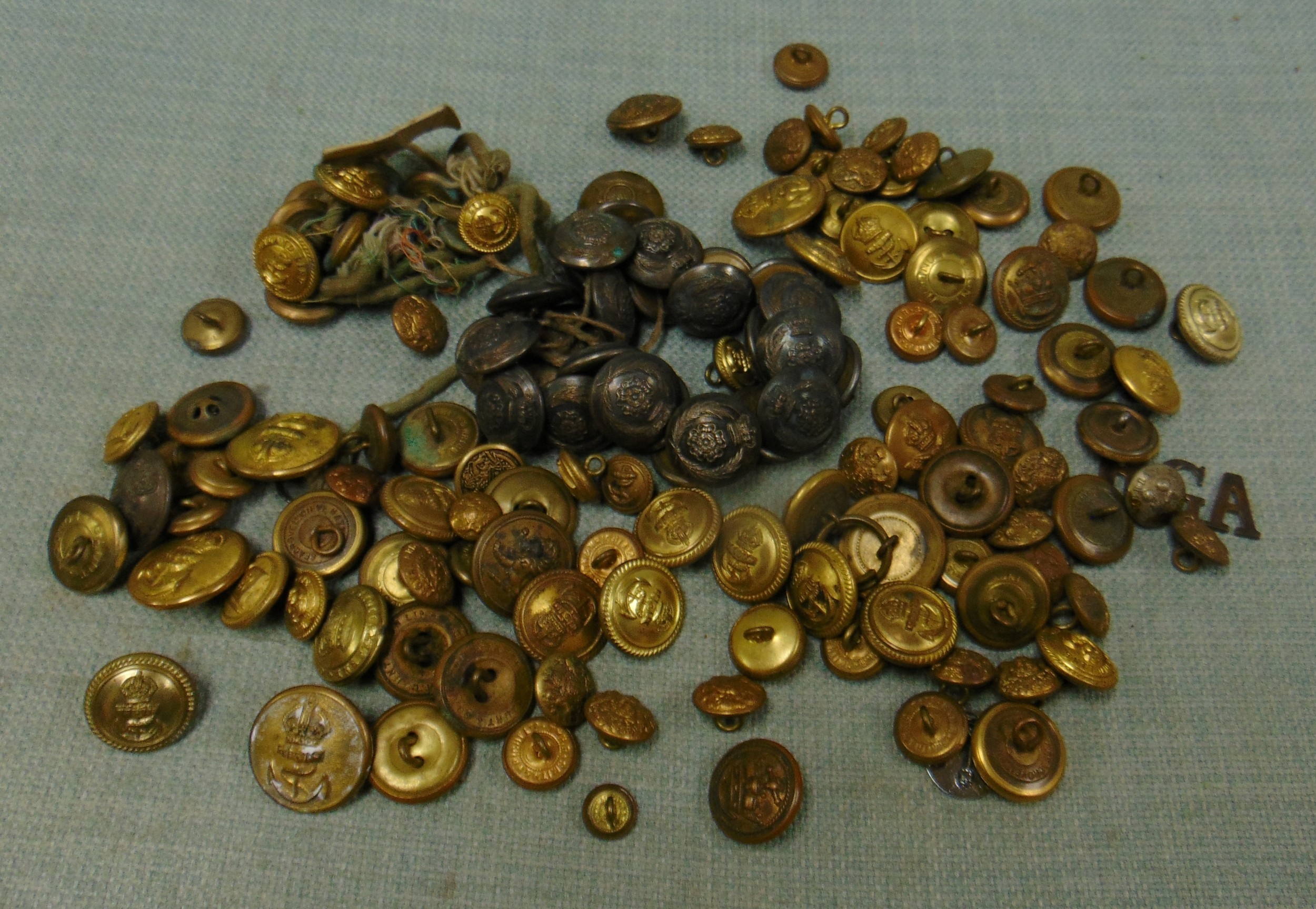 Interesting collection of naval and military badges.