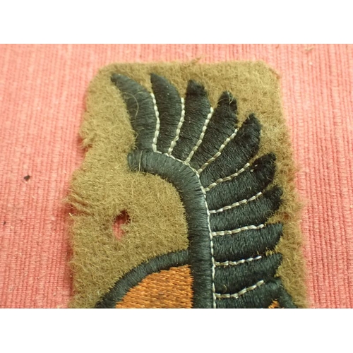 197 - WW2 Polish Armoured division sleeve patch

British made for the exiled Polish army. On emoth hole.