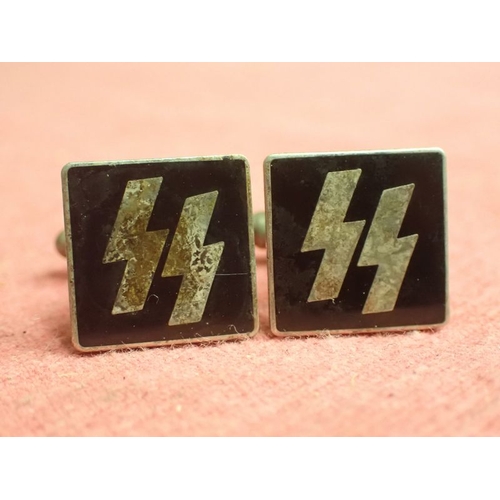 198 - WW2 German, Pair of SS cufflinks

Rare private purchase cufflinks. Nickel-silver with black enamel. ... 