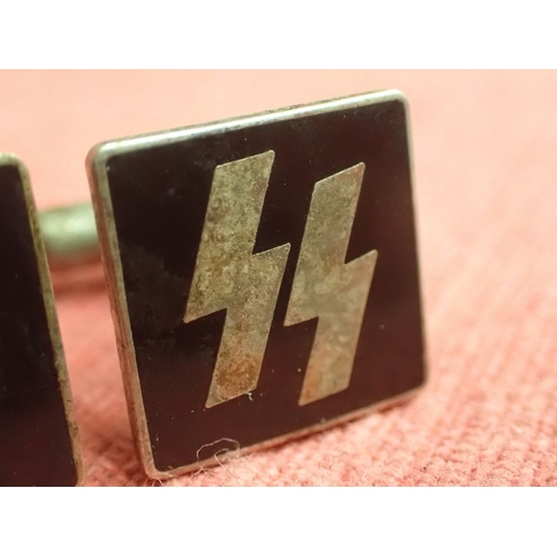 198 - WW2 German, Pair of SS cufflinks

Rare private purchase cufflinks. Nickel-silver with black enamel. ... 