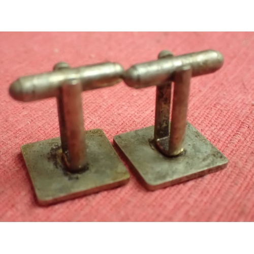 198 - WW2 German, Pair of SS cufflinks

Rare private purchase cufflinks. Nickel-silver with black enamel. ... 