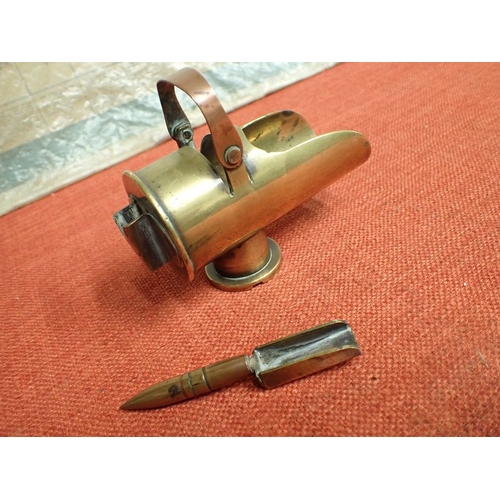 292 - WW1 TRENCH ART SHELL CASE COAL SCUTTLE

COAL SCUTTLE MADE USING BRITISH SHELL CASES. THE LARGER ONE ... 