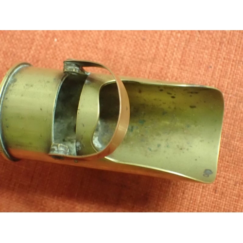292 - WW1 TRENCH ART SHELL CASE COAL SCUTTLE

COAL SCUTTLE MADE USING BRITISH SHELL CASES. THE LARGER ONE ... 