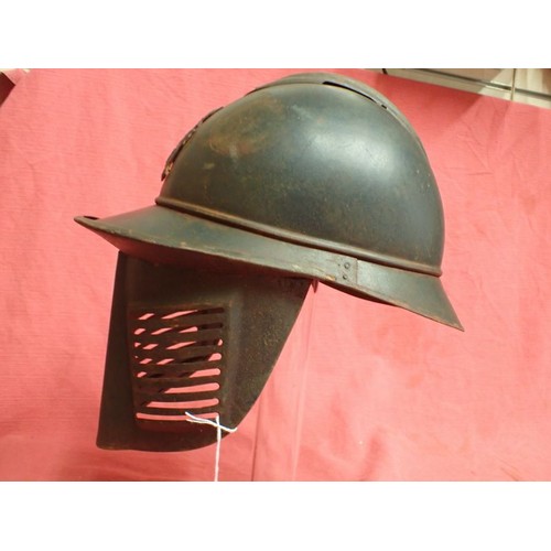 174 - WW1 French helmet with steel face guard

WW1 French M15 Adriane Helmet (no liner) with a Rare Polack... 