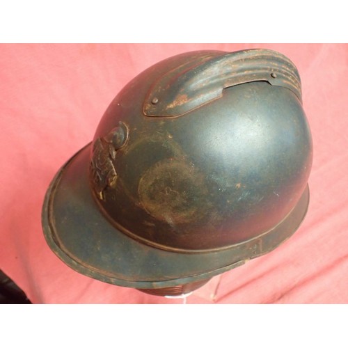 174 - WW1 French helmet with steel face guard

WW1 French M15 Adriane Helmet (no liner) with a Rare Polack... 