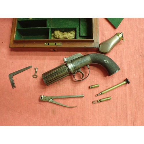 302 - Cased, near mint percussion pepperbox revolver

An English percussion pepperbox revolver circa 1840 ... 