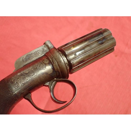302 - Cased, near mint percussion pepperbox revolver

An English percussion pepperbox revolver circa 1840 ... 