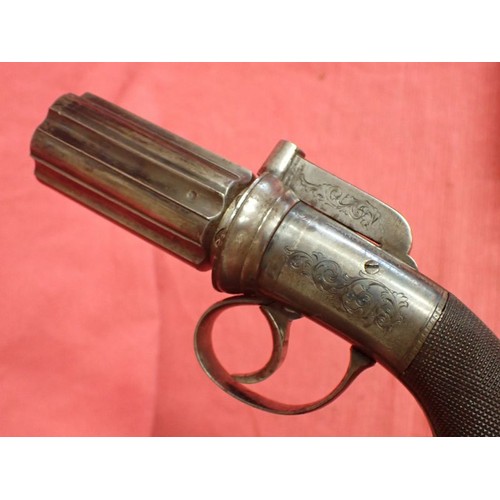 302 - Cased, near mint percussion pepperbox revolver

An English percussion pepperbox revolver circa 1840 ... 