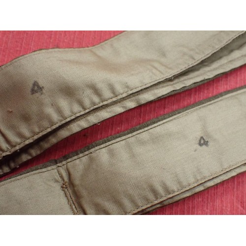 7 - Two WW2 British 1944 dated shirt collars

Two size 4 button on collars. Wear to the fold line on one... 