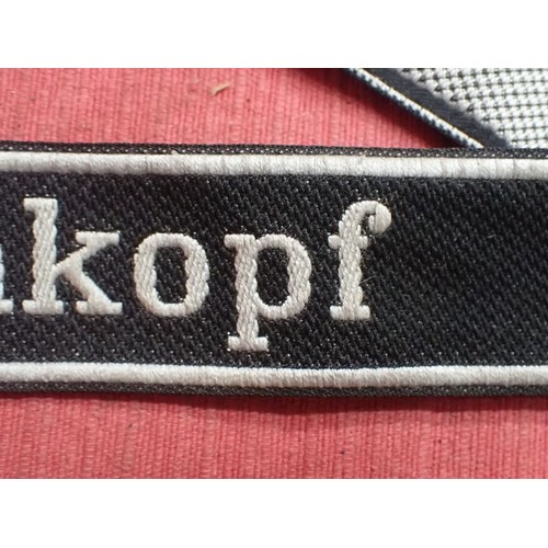10 - WW2 Waffen-SS Totenkopf Division cuff title

In excellent clean condition. Slight fraying to the end... 