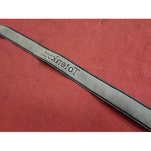 10 - WW2 Waffen-SS Totenkopf Division cuff title

In excellent clean condition. Slight fraying to the end... 