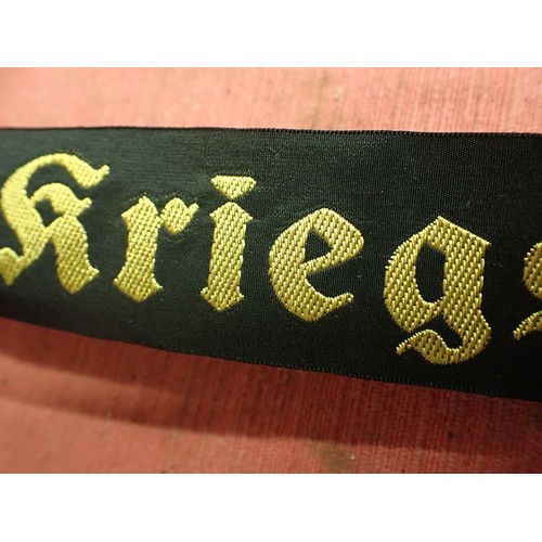 11 - WW2 German Kriegsmarine cap tally

Tally in good clean condition. Still at full length. Some creases... 