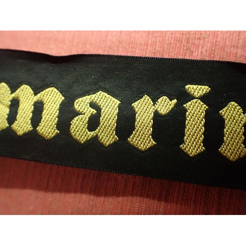 11 - WW2 German Kriegsmarine cap tally

Tally in good clean condition. Still at full length. Some creases... 