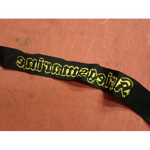11 - WW2 German Kriegsmarine cap tally

Tally in good clean condition. Still at full length. Some creases... 