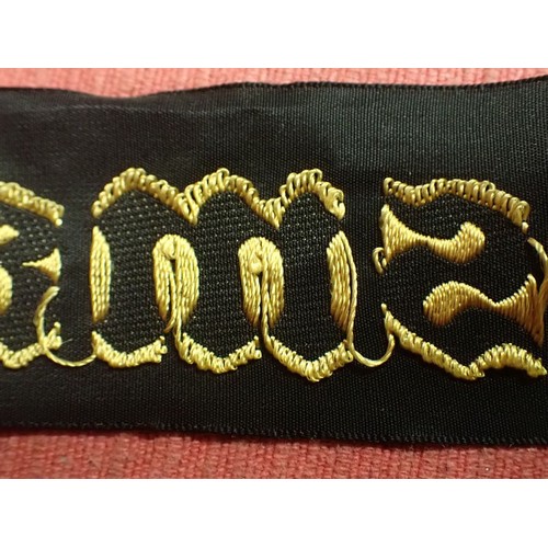 11 - WW2 German Kriegsmarine cap tally

Tally in good clean condition. Still at full length. Some creases... 
