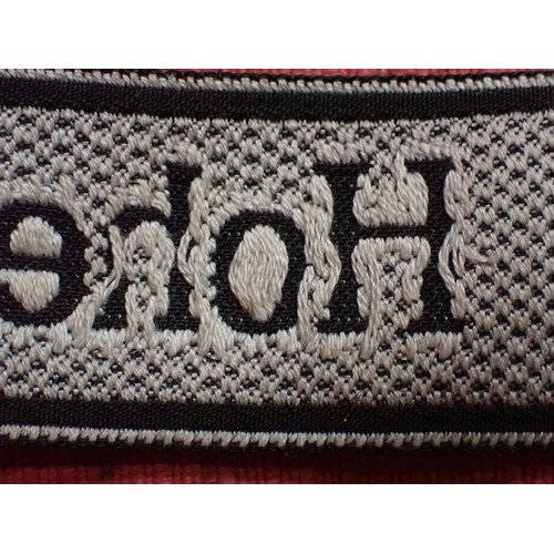 12 - WW2 German Waffen-SS Hohenstaufen Div cuff title

Good condition Bevo title. Folded and stitched end... 