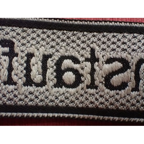 12 - WW2 German Waffen-SS Hohenstaufen Div cuff title

Good condition Bevo title. Folded and stitched end... 