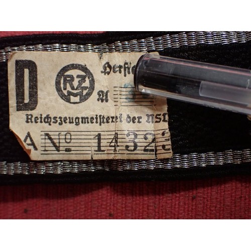 13 - WW2 SS-Feldgendarmerie cuff title

Aluminium wirework edging. The script is in a grey-silver-coloure... 
