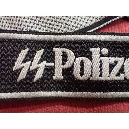 14 - WW2 German SS-Polizei-Division cuff title

Rare cuff in very good, clean condition. 470 mm long.