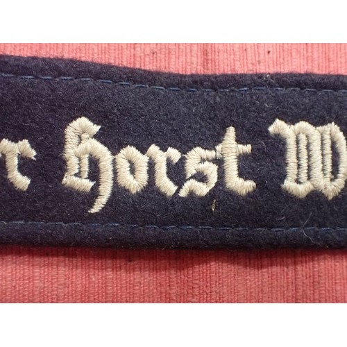 15 - WW2 Luftwaffe Geschwader Horst Wessel cuff title

Dark blue woollen cuff with white gothic script st... 