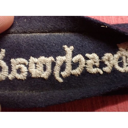 15 - WW2 Luftwaffe Geschwader Horst Wessel cuff title

Dark blue woollen cuff with white gothic script st... 